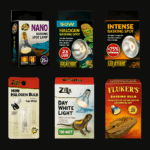 Reptile lighting products category image showing Zoo Med, Exo Terra, Zilla, and Fluker’s basking bulbs and halogen lamps on a black background.